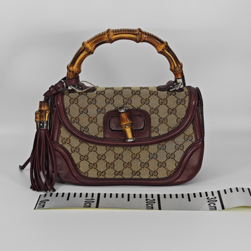 GUCCI 内部褪色和污渍（S)